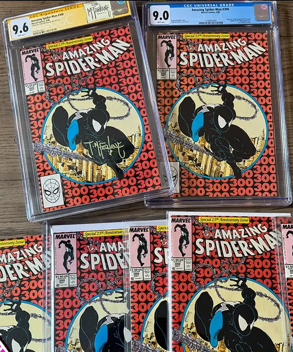 Several copies of Amazing Spider-Man #300, two CGC graded